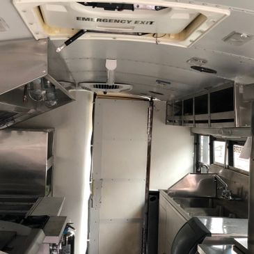 THE TANK LARGE BUS LOADED WITH COMMERCIAL GRADE APPLIANCES