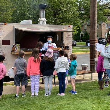 Whimsical Stonework Pizza Trailer
