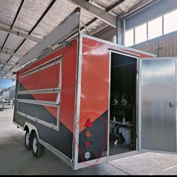 Full-Sized Food Trailer with Mounted Sign