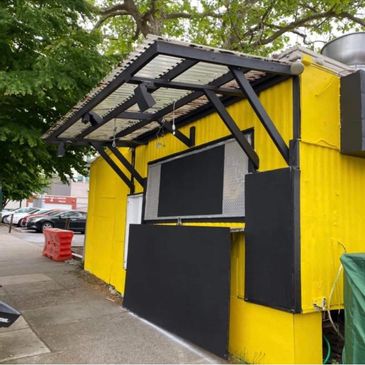 Bright Yellow Food Cart Near PSU